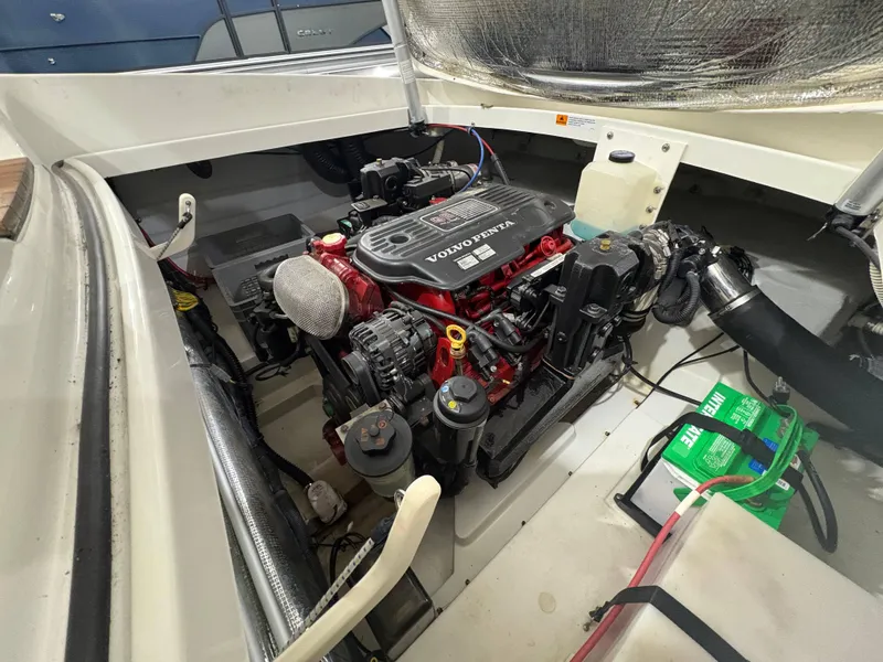 Slide: The Image of 2009 Chris-Craft Launch 25 Heritage Ed engine compartment with Volvo Penta engine. - 17
