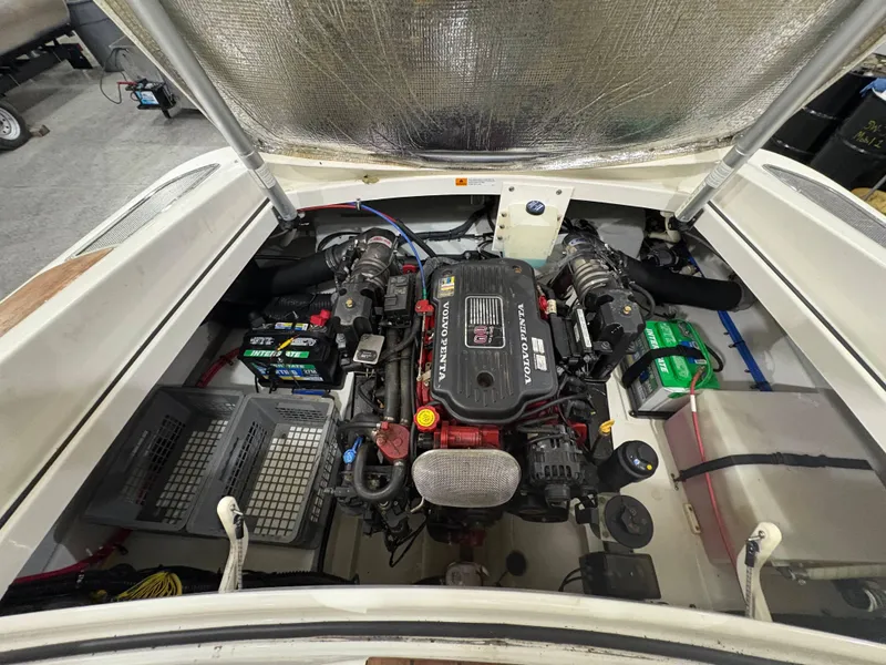 Slide: The Image of 2009 Chris-Craft Launch 25 Heritage Ed engine compartment with Volvo Penta engine. - 24