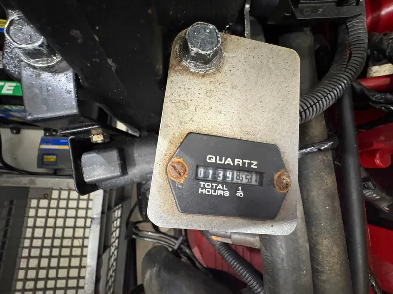 Slide: The Image of Hour meter showing 139.6 hours on 2009 Chris-Craft Launch 25 Heritage Edition. - 25