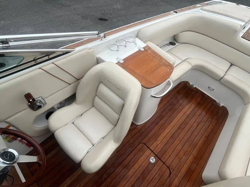Slide: The Image of 2009 Chris-Craft Launch 25 Heritage Edition interior with luxurious seating and wooden flooring. - 29