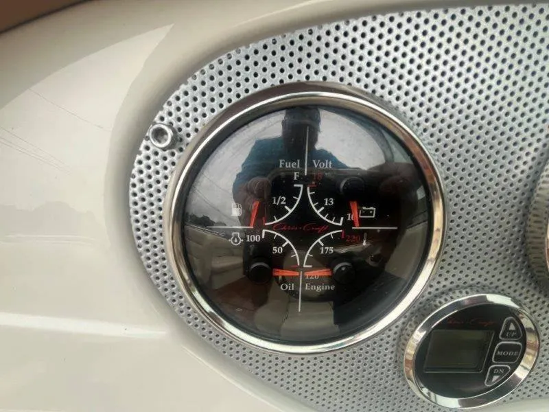 Slide: The Image of Dashboard gauges of a 2009 Chris-Craft Launch 25 Heritage Edition boat. - 31