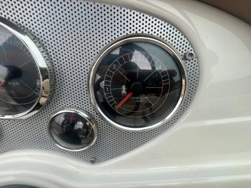 Slide: The Image of Close-up of 2009 Chris-Craft Launch 25 Heritage Edition dashboard gauges. - 32