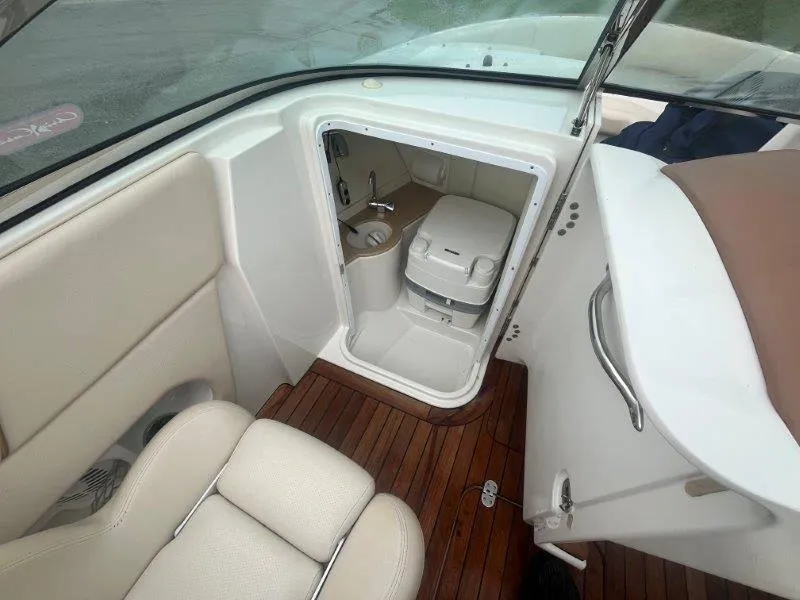 Slide: The Image of 2009 Chris-Craft Launch 25 Heritage Edition boat interior with compact bathroom. - 39