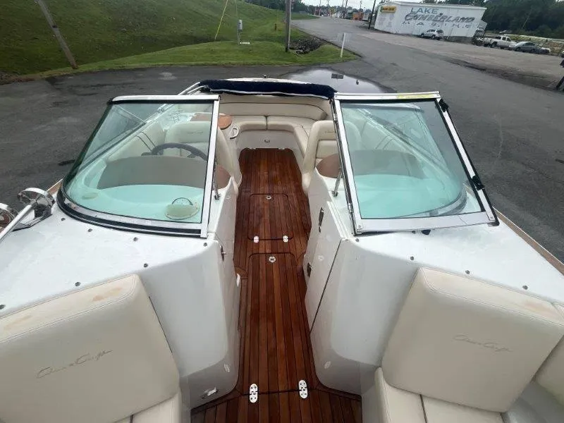 Slide: The Image of 2009 Chris-Craft Launch 25 Heritage Edition boat with teak deck and open cockpit. - 46