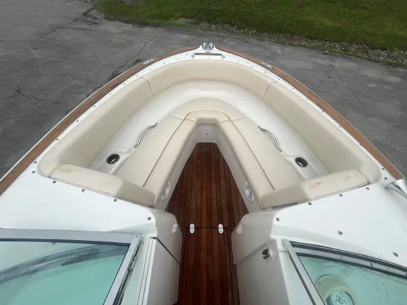 Slide: The Image of 2009 Chris-Craft Launch 25 Heritage Edition boat with elegant seating and wooden deck. - 49