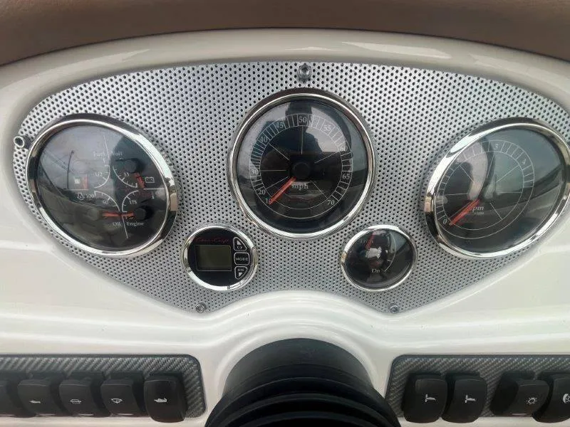 Slide: The Image of Dashboard of 2009 Chris-Craft Launch 25 Heritage Edition with speedometer and gauges. - 52