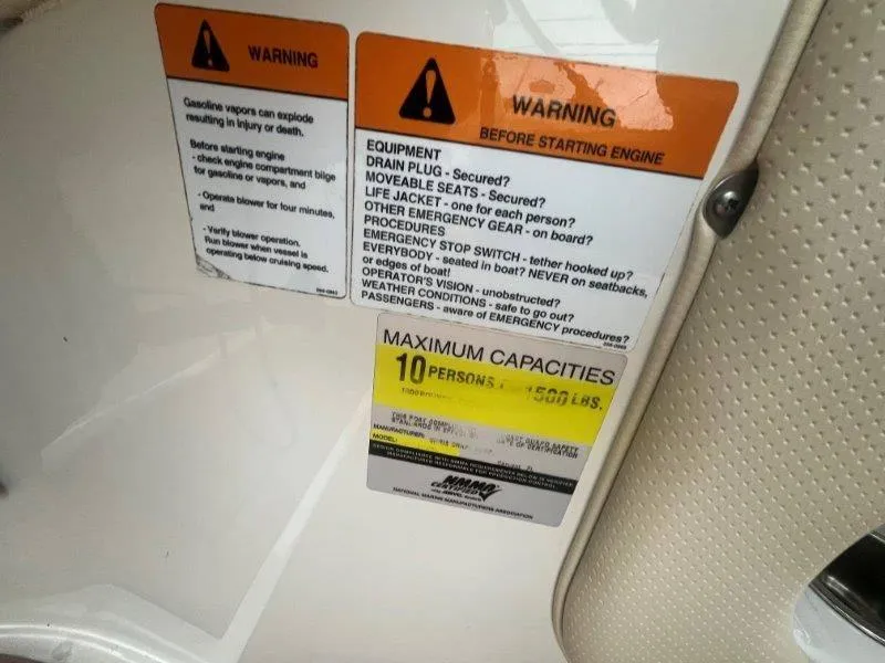 Slide: The Image of Warning labels on 2009 Chris-Craft Launch 25 Heritage Ed, maximum capacity 10 persons. - 53