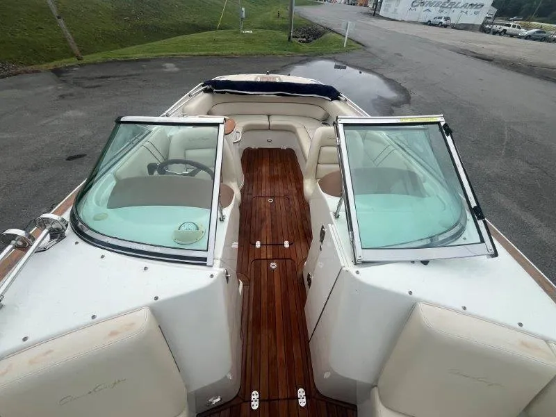 Slide: The Image of 2009 Chris-Craft Launch 25 Heritage Edition boat with open cockpit and wooden deck. - 60