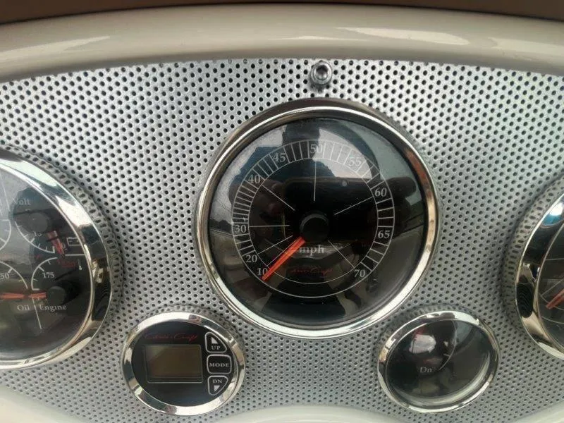 Slide: The Image of Dashboard of 2009 Chris-Craft Launch 25 Heritage Ed boat with speedometer and gauges. - 61