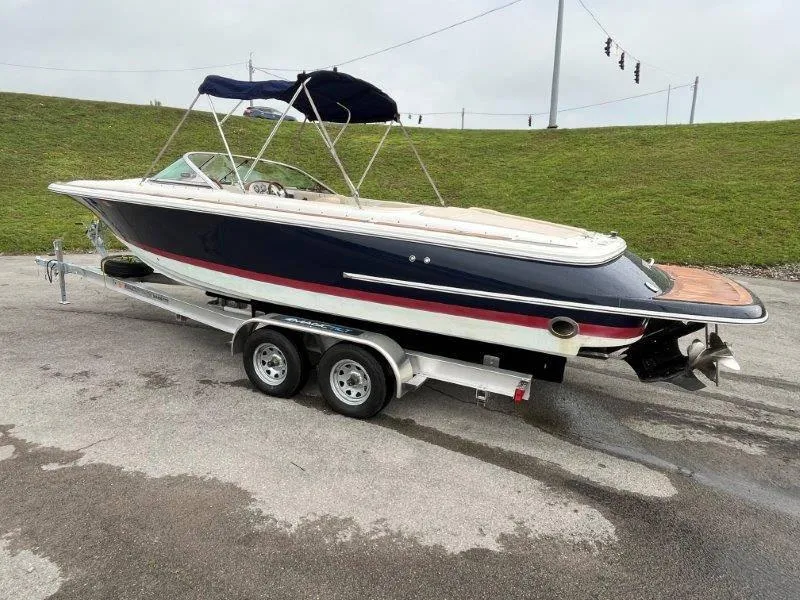 Slide: The Image of 2009 Chris-Craft Launch 25 Heritage Edition boat on trailer, side view. - 8