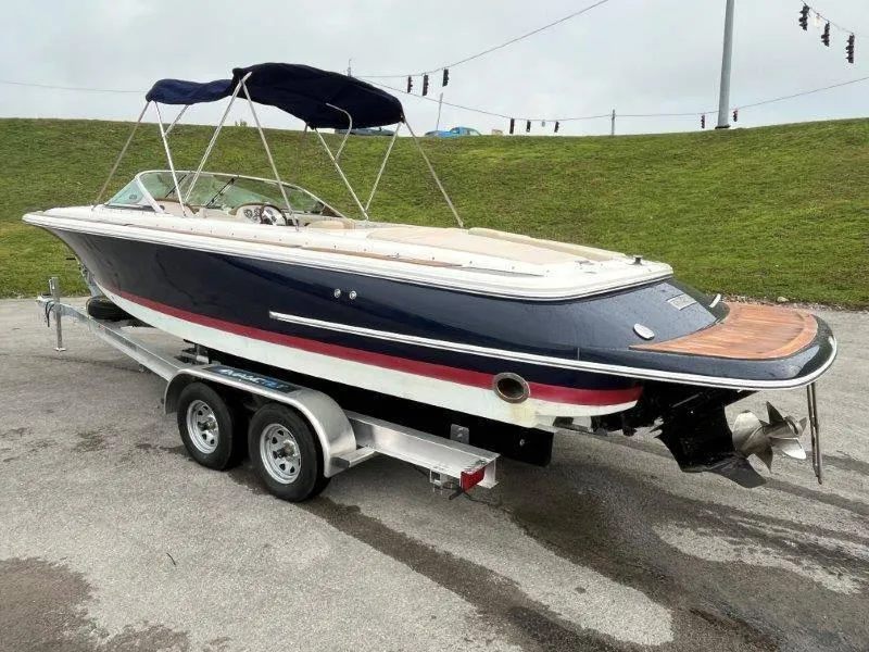 Slide: The Image of 2009 Chris-Craft Launch 25 Heritage Edition boat on trailer, side view. - 9