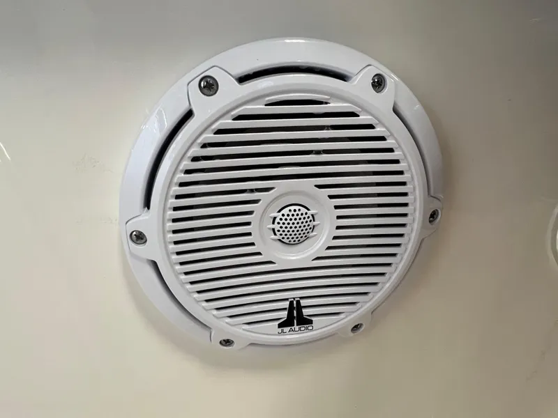 Slide: The Image of White JL Audio speaker on 2024 Pioneer 202 Islander boat. - 11