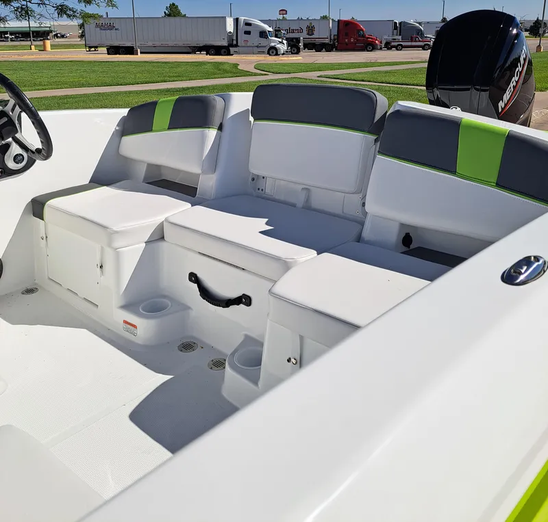 Slide: The Image of 2024 Tahoe T18 boat interior with cushioned seating and modern design. - 6