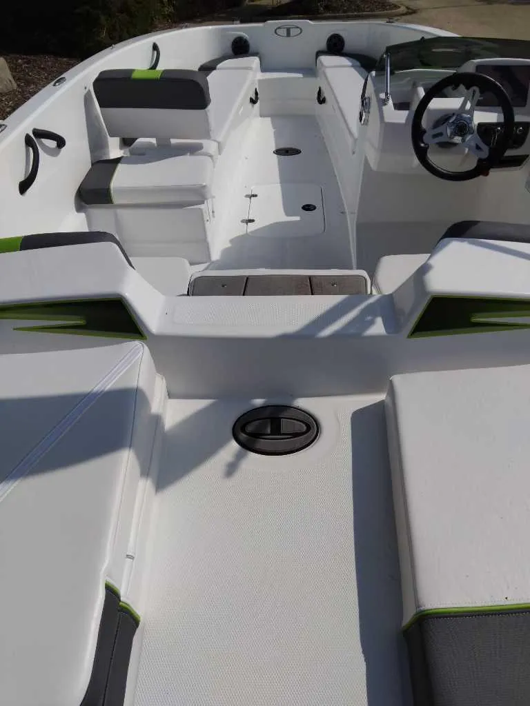 Slide: The Image of 2024 Tahoe T18 boat interior with seating and steering wheel. - 3