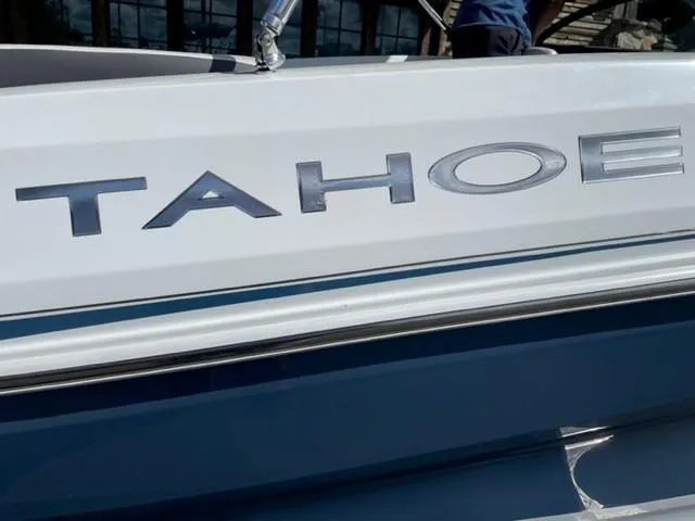 Slide: The Image of 2021 Tahoe TAH500TS boat with sleek design and bold lettering. - 5