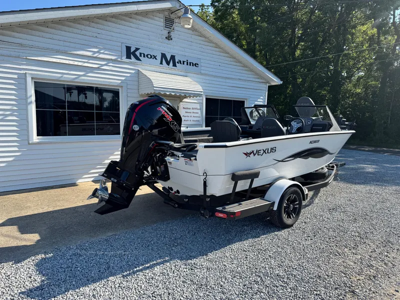 Slide: The Image of 2025 Vexus ADX180LS boat at Knox Marine dealership. - 3