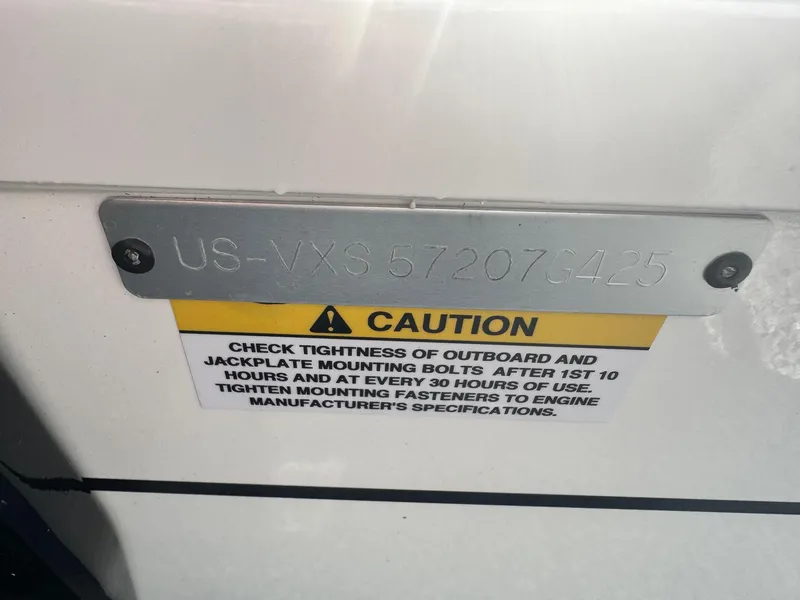 Slide: The Image of Vexus ADX180LS 2025 caution label with serial number and maintenance instructions. - 4