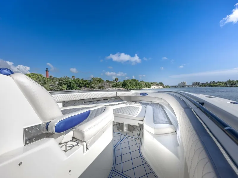 Slide: The Image of 2014 Hydra-Sports 42 Custom Siesta boat interior with luxurious seating on a sunny day. - 14