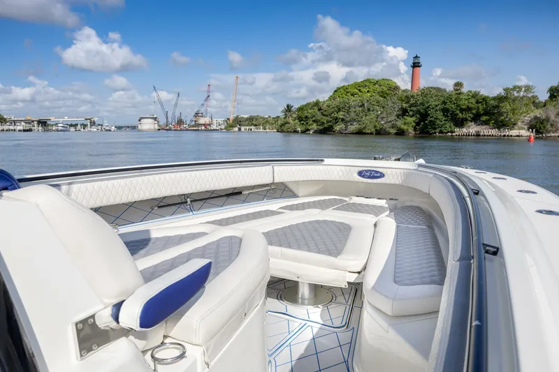 Slide: The Image of 2014 Hydra-Sports 42 Custom Siesta boat on scenic waterway with lighthouse view. - 15