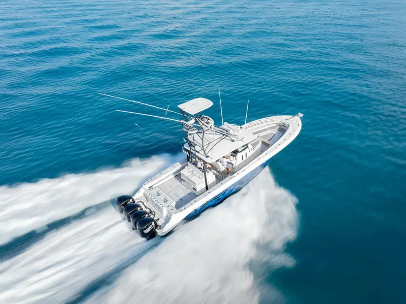 Slide: The Image of 2014 Hydra-Sports 42 Custom Siesta boat speeding on open water. - 3