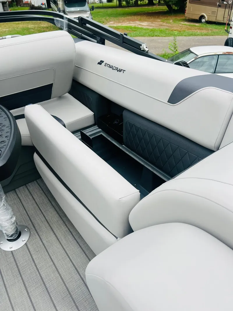 Slide: The Image of 2025 Starcraft CX 23 DL BAR boat interior with luxurious seating and modern design. - 11