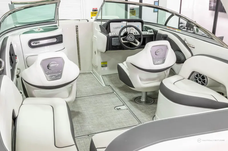 Slide: The Image of 2023 Crownline 260 XSS boat interior with modern seating and dashboard. - 28