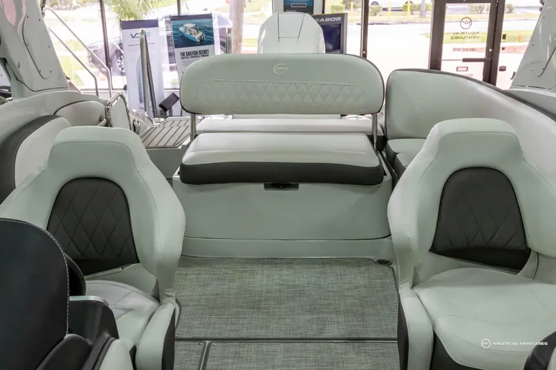 Slide: The Image of 2023 Crownline 260 XSS boat interior with plush seating and modern design. - 29