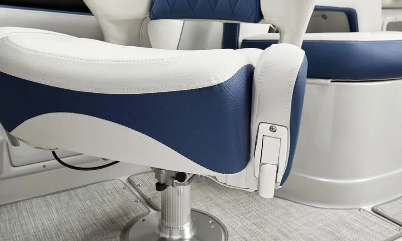 Slide: The Image of 2023 Crownline 260 XSS boat seat with blue and white upholstery. - 48