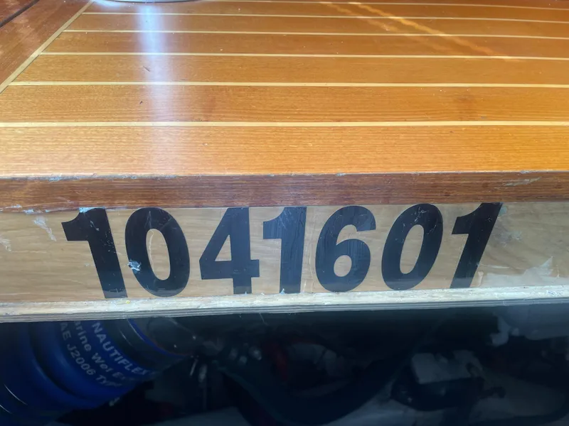 Slide: The Image of Wooden surface with number 1041601, Lyman-Morse Custom Flybridge, 1997 model. - 35