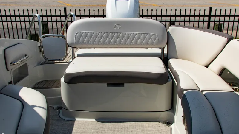 Slide: The Image of 2023 Crownline 290 XSS boat interior with luxurious seating and modern design. - 17