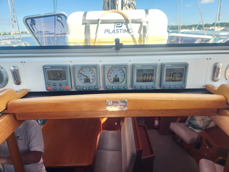 Slide: The Image of Control panel of a 2008 Hallberg-Rassy 62 yacht with navigation instruments. - 25