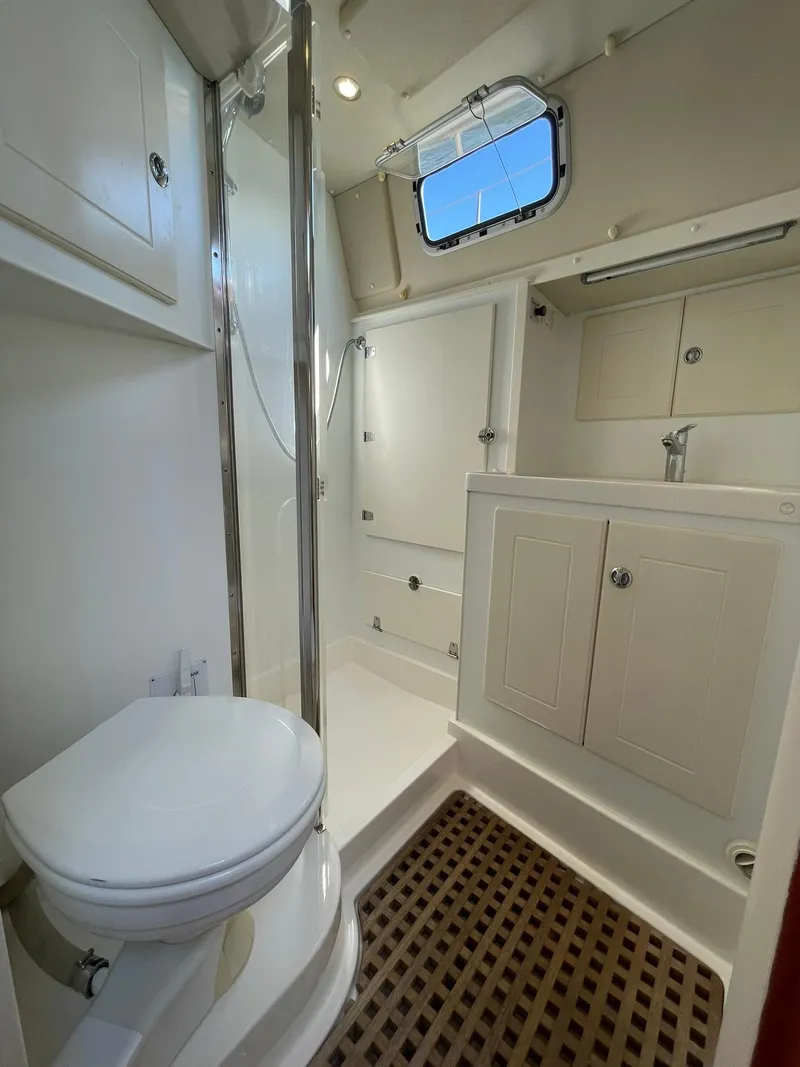 Slide: The Image of Bathroom interior of 2008 Hallberg-Rassy 62 yacht with shower and toilet. - 48