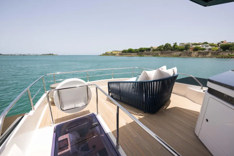 Slide: The Image of Luxurious 2023 Ferretti Yachts 720 deck with ocean view and modern seating. - 13