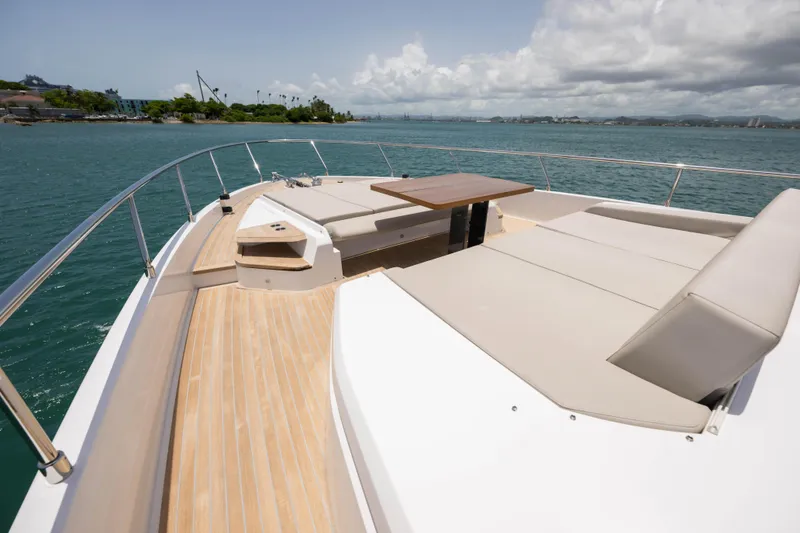 Slide: The Image of Luxurious 2023 Ferretti Yachts 720 deck with sun loungers and ocean view. - 19