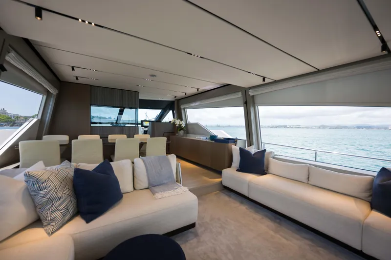 Slide: The Image of Luxurious interior of 2023 Ferretti Yachts 720 with elegant seating and ocean view. - 30