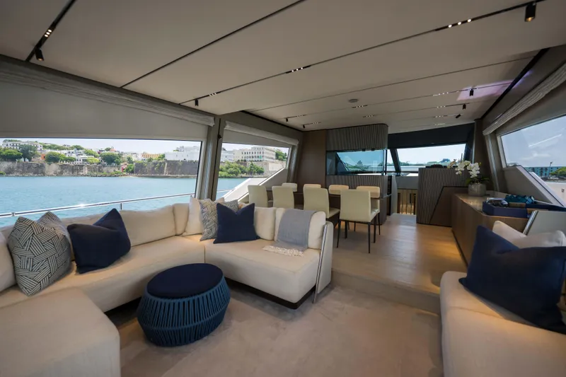 Slide: The Image of Luxurious interior of 2023 Ferretti Yachts 720 with elegant seating and dining area. - 34
