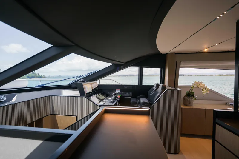 Slide: The Image of Luxurious interior of 2023 Ferretti Yachts 720, featuring modern helm and panoramic windows. - 37