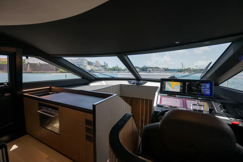 Slide: The Image of Interior of 2023 Ferretti Yachts 720, featuring modern helm and navigation systems. - 39