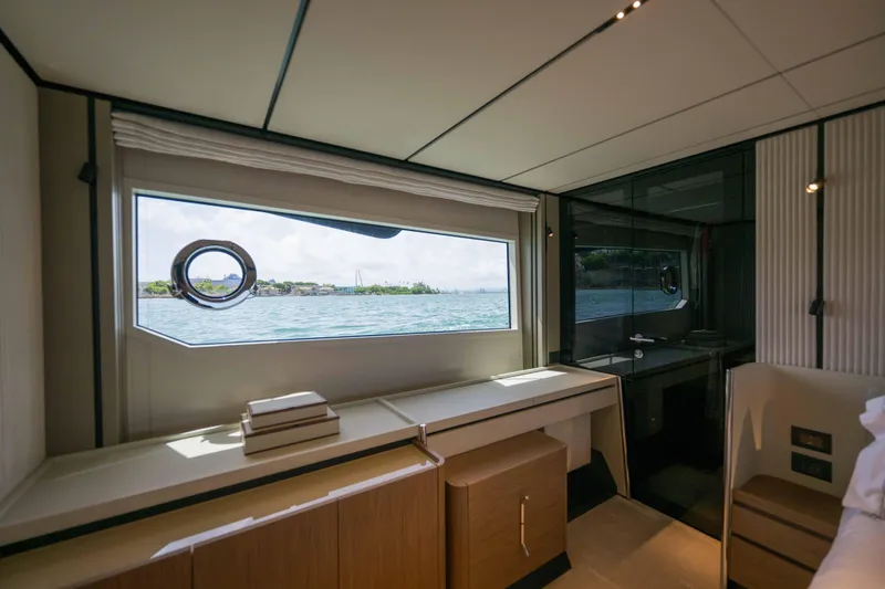 Slide: The Image of Luxurious interior of 2023 Ferretti Yachts 720 with ocean view window. - 45