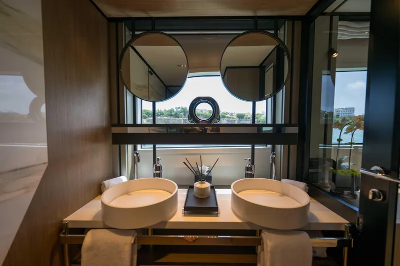 Slide: The Image of Luxurious bathroom in 2023 Ferretti Yachts 720 with dual sinks and modern mirrors. - 47