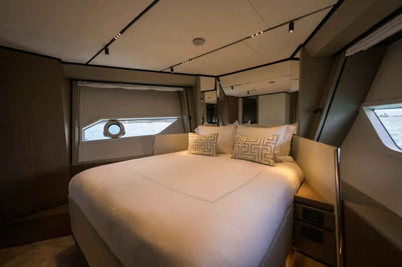 Slide: The Image of Luxurious bedroom interior of 2023 Ferretti Yachts 720 with elegant bedding and modern design. - 48