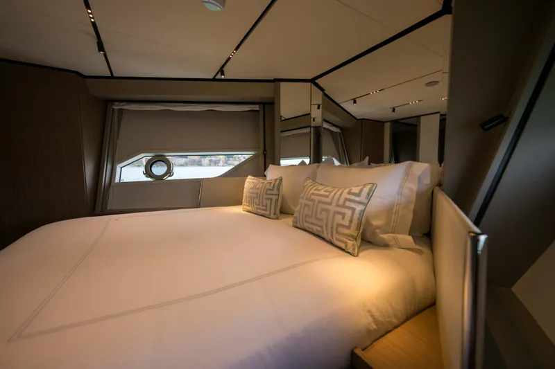Slide: The Image of Luxurious bedroom interior of 2023 Ferretti Yachts 720 with elegant bedding and modern design. - 49
