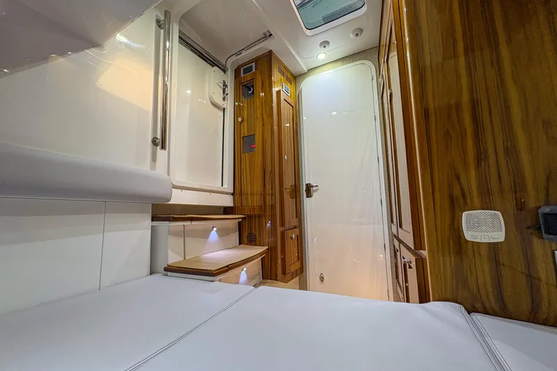 Slide: The Image of Luxurious interior of 2024 HCB 53' Suenos yacht with wood paneling and modern design. - 20