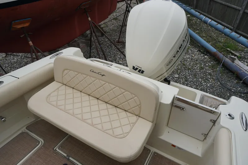 Slide: The Image of 2018 Chris-Craft Catalina 26 boat with Yamaha V8 engine and cushioned seating. - 3