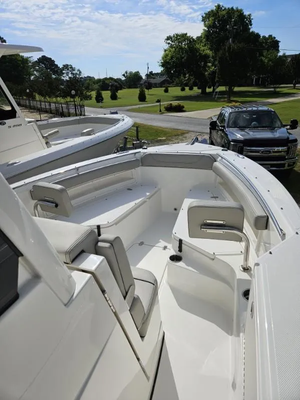 Slide: The Image of 2024 Pursuit S 248 Sport boat with sleek seating and modern design. - 14