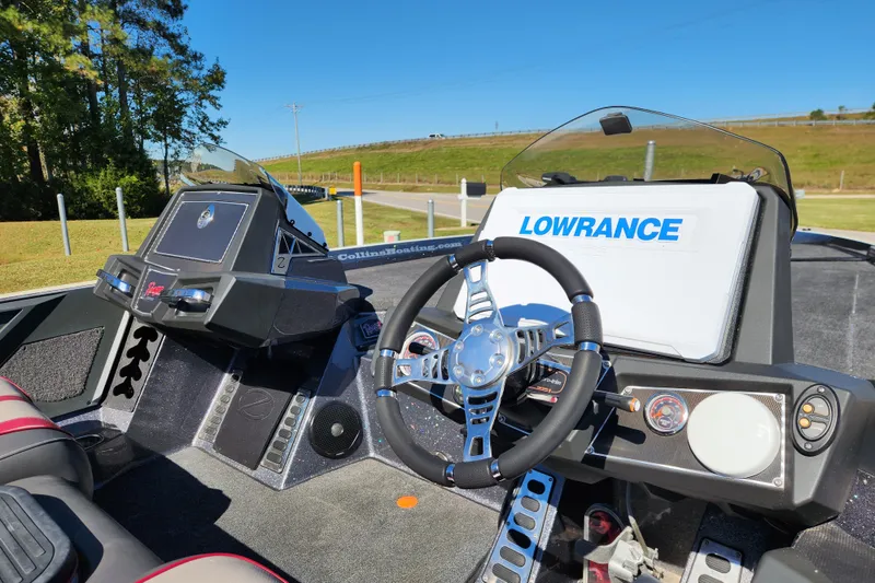 Slide: The Image of 2019 Ranger Z520L boat dashboard with Lowrance electronics and steering wheel. - 11