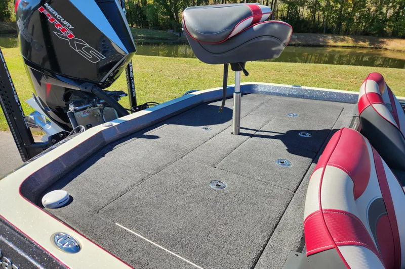 Slide: The Image of 2019 Ranger Z520L boat deck with red and gray seats, Mercury Pro XS engine. - 13
