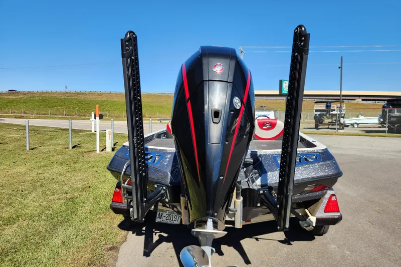 Slide: The Image of 2019 Ranger Z520L boat with powerful outboard motor, parked on a sunny day. - 3