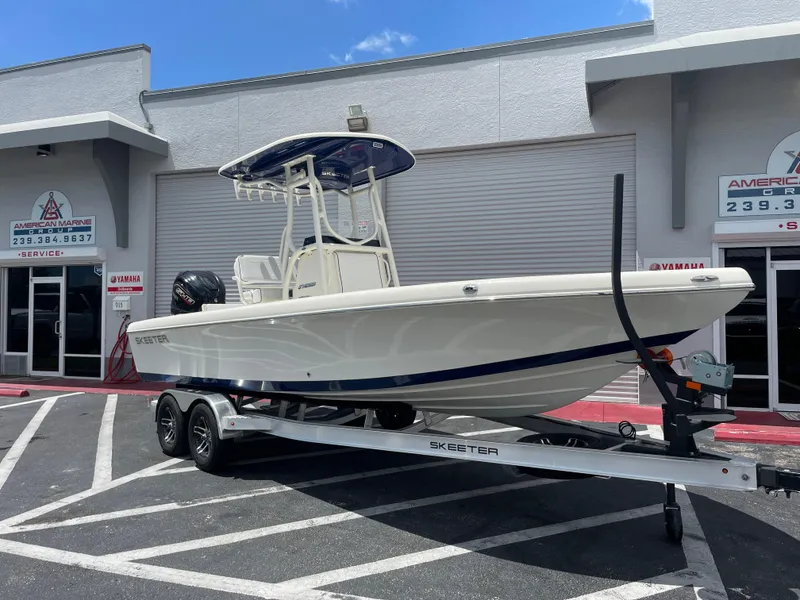 The Image of 2024 Skeeter SX 2350 boat on trailer outside dealership. - 0