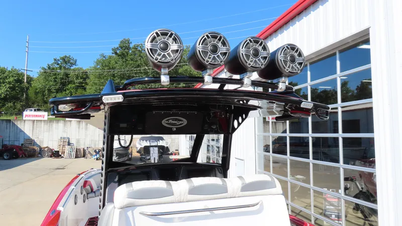 Slide: The Image of 2014 Sunsation 34 CCX boat dashboard with dual screens and modern controls. - 10